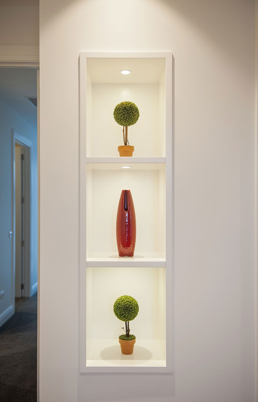 Built in to the wall display shelves